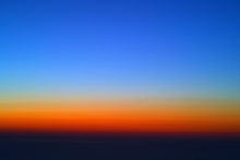 Langit penuh warna di kala senja (Sumber: wikipedia).